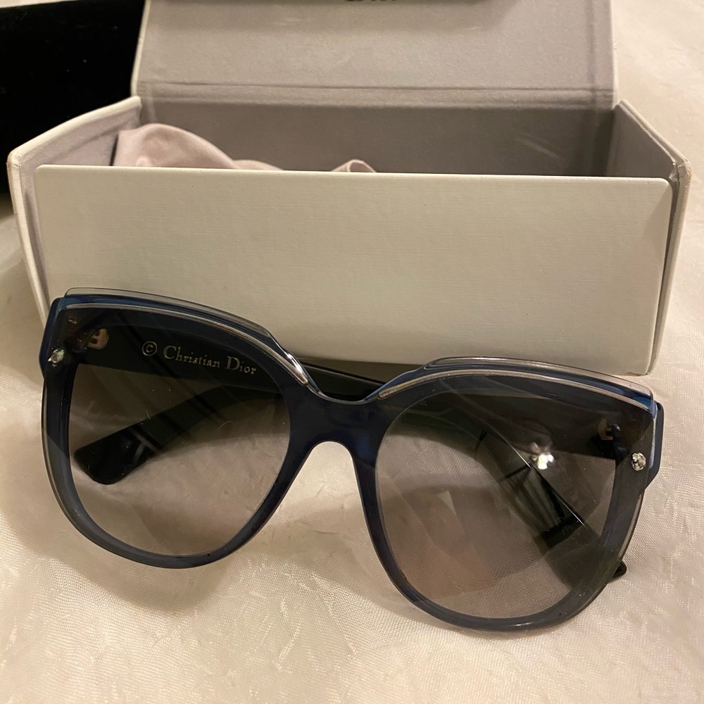 Christian Dior sunglasses. Gray color, dark lense
